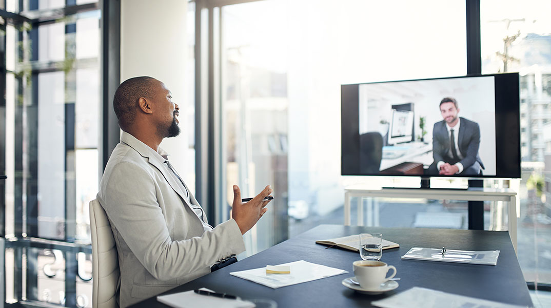 I appreciate that you took the time to chat Shot of two businessmen having a video conference